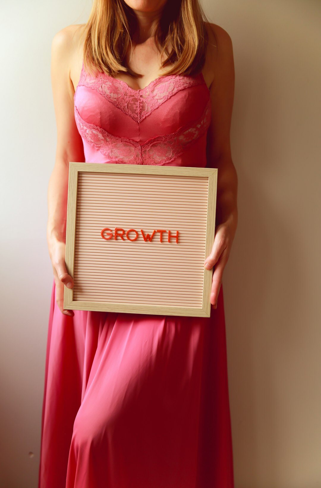 Businesswoman presenting a growth chart to colleagues